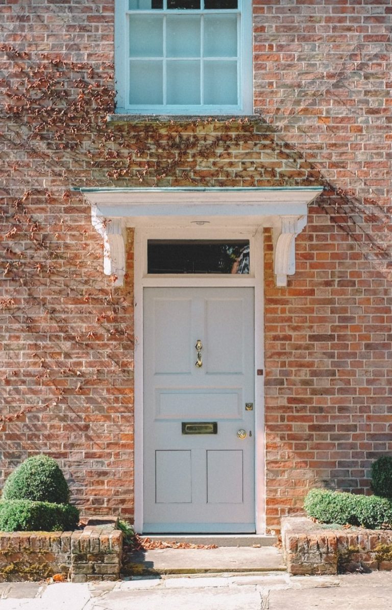 Front door of brick property